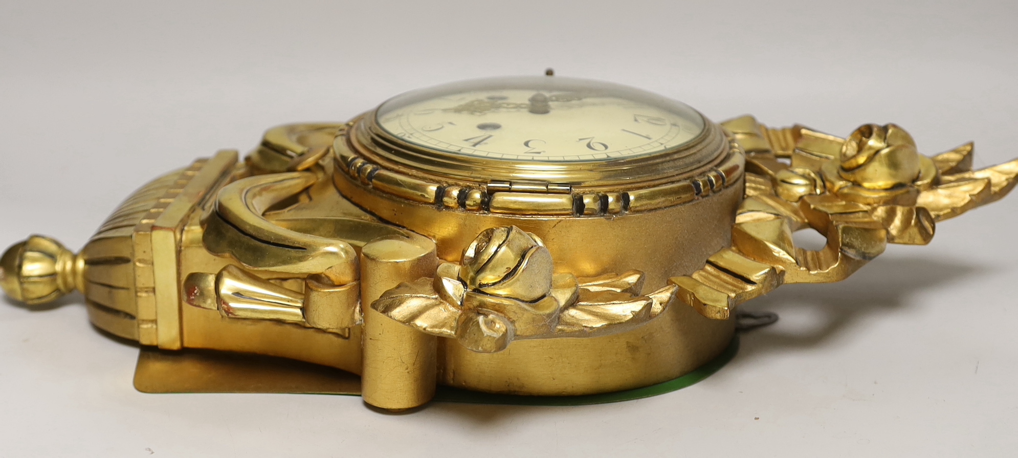 An early 20th century gilt wood cartel wall clock, 50cm high